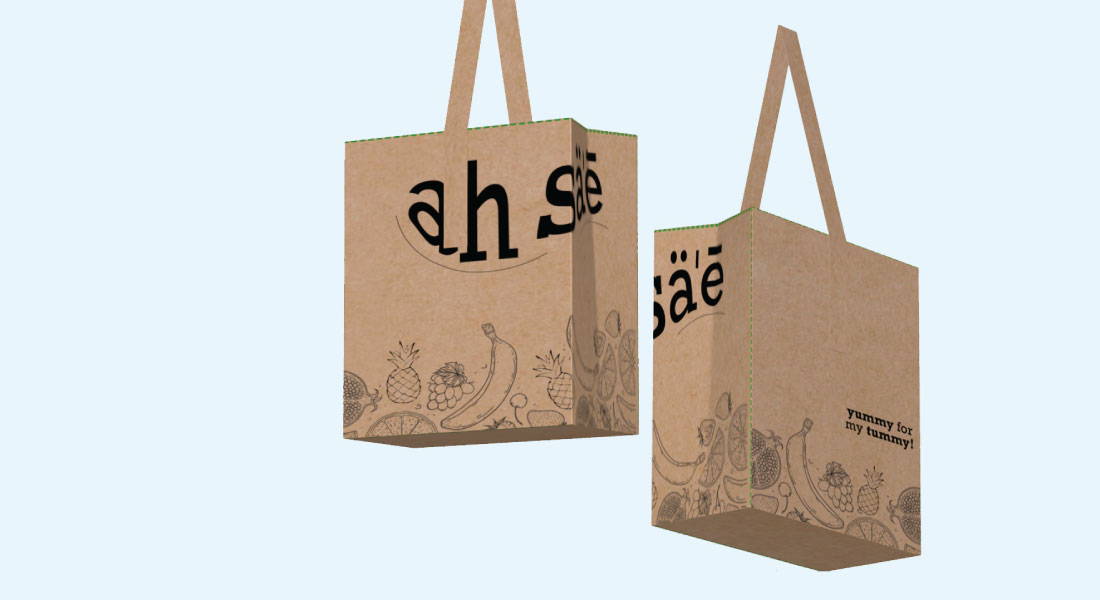 Ah Sae branded kraft tote bags with playful line illustrations