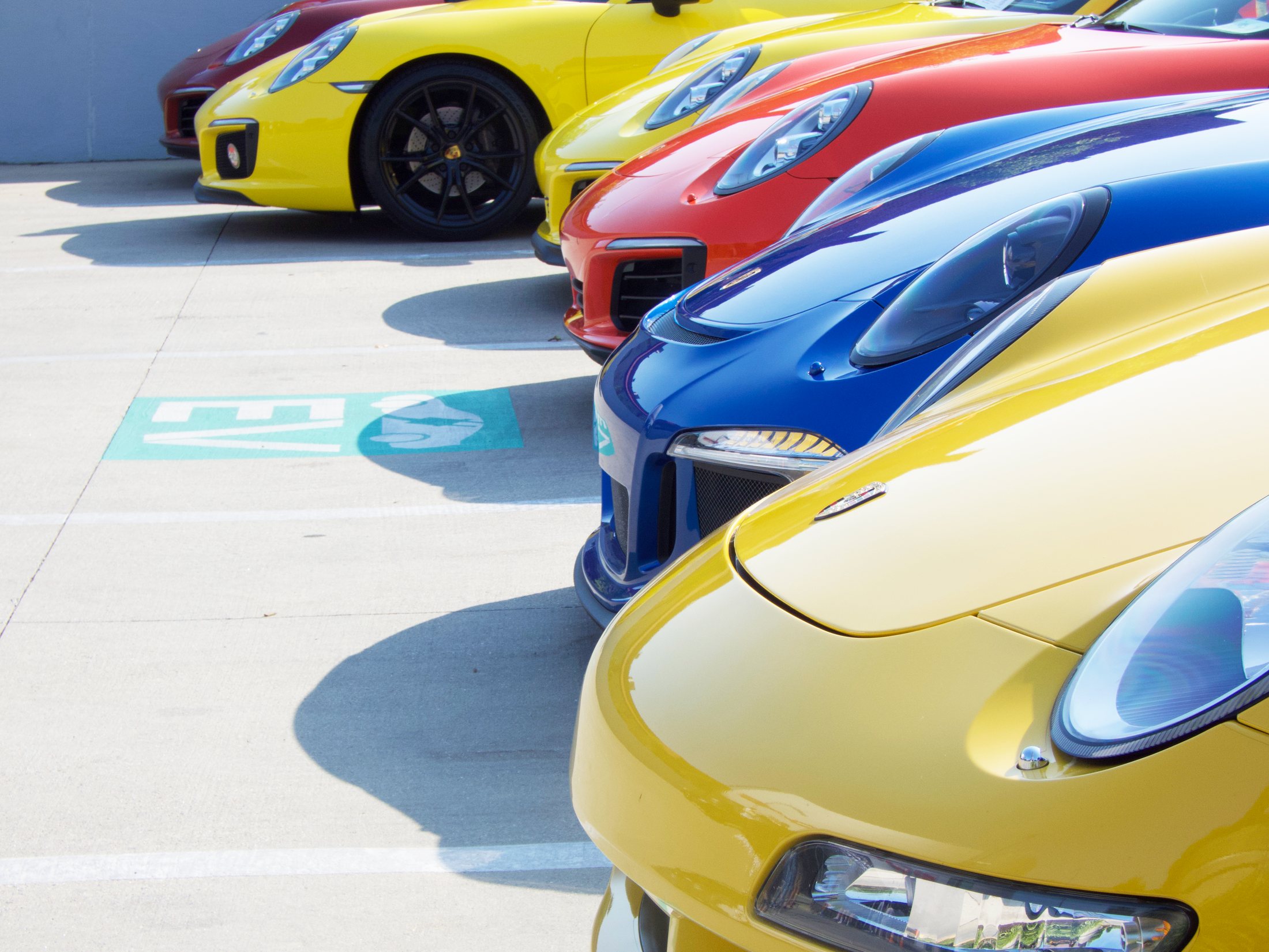 Colorful Porsche sports cars at the anniversary event